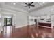 Hardwood floors and open floor plan connects living room to kitchen area at 106 Kelly Marie Ct, Kings Mountain, NC 28086