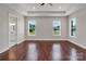 Spacious bedroom with tray ceiling, ceiling fan, large windows and access to the main bathroom at 106 Kelly Marie Ct, Kings Mountain, NC 28086