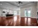 Spacious open-concept layout with hardwood floors connecting the living area and a modern kitchen at 106 Kelly Marie Ct, Kings Mountain, NC 28086