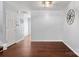 Open dining room with hardwood floors, modern lighting, and ample natural light at 11023 Kinston Ridge Pl, Charlotte, NC 28273