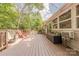 Spacious back deck with outdoor seating, ideal for relaxation and entertaining at 11834 Carmel Lakes Dr, Charlotte, NC 28226