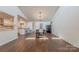 Bright dining area with hardwood floors, chandelier, and an open layout at 11834 Carmel Lakes Dr, Charlotte, NC 28226