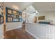 Inviting foyer with hardwood floors and stylish wall decor leading to an open living area at 11834 Carmel Lakes Dr, Charlotte, NC 28226