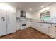 Bright, renovated kitchen featuring stainless steel appliances and marble backsplash at 11834 Carmel Lakes Dr, Charlotte, NC 28226