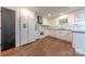 Bright kitchen with stainless steel appliances and lovely marble backsplash at 11834 Carmel Lakes Dr, Charlotte, NC 28226