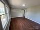 Spacious living room with hardwood floors and natural light from a large window at 120 Tower Dr, Statesville, NC 28677