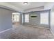 Bright bedroom boasting ample space and natural light from the windows at 1325 Grantwood Nw Ave, Concord, NC 28027
