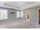 Large bedroom with lots of natural light and tray ceilings at 1325 Grantwood Nw Ave, Concord, NC 28027