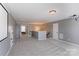 Large bonus room with neutral walls, carpet, stairs, a ceiling light, and access to other rooms at 1325 Grantwood Nw Ave, Concord, NC 28027