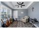 Bonus room with a vaulted ceiling, ceiling fan, and several guitars at 133 Harbourtown Dr, Kings Mountain, NC 28086
