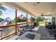 Enjoy the scenic view from this large covered patio, perfect for outdoor entertaining and relaxation at 133 Harbourtown Dr, Kings Mountain, NC 28086
