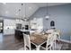 Spacious eat-in kitchen with an island, stainless steel appliances, and pendant lighting at 133 Harbourtown Dr, Kings Mountain, NC 28086