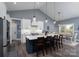 Open eat-in kitchen with a large island, stainless steel appliances, and modern lighting at 133 Harbourtown Dr, Kings Mountain, NC 28086