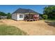 Charming home with a cozy back deck, perfect for outdoor relaxation and entertaining at 133 Harbourtown Dr, Kings Mountain, NC 28086