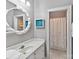 Cozy bathroom featuring a white vanity and sink and an entrance to the shower at 15009 Fanning Manor Ct, Charlotte, NC 28277
