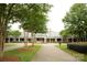 Elegant Ballantyne clubhouse with manicured lawns and walkways at 15009 Fanning Manor Ct, Charlotte, NC 28277