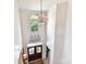 Grand entryway with a chandelier, a decorative front door, and a high ceiling at 15009 Fanning Manor Ct, Charlotte, NC 28277