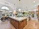 Open kitchen features a large island, modern appliances, and plenty of natural light at 15009 Fanning Manor Ct, Charlotte, NC 28277