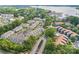 Gorgeous aerial view of a beautiful community with green trees, swimming pool, and parking at 17431 Tuscany Ln, Cornelius, NC 28031