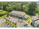 Aerial shot of the property showcasing lush landscaping and ample parking at 17431 Tuscany Ln, Cornelius, NC 28031