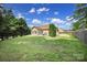 View of the home's backyard with a lawn, patio, and landscaping at 2000 Taney Way, Indian Land, SC 29707