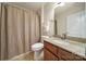 Bathroom featuring tile floors, granite vanity, and shower with curtain at 2000 Taney Way, Indian Land, SC 29707