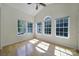 Bright, airy bedroom with large windows offering ample natural light and hardwood floors at 2000 Taney Way, Indian Land, SC 29707