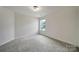 Bedroom featuring a window and neutral carpet at 2000 Taney Way, Indian Land, SC 29707
