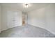Bedroom featuring neutral carpet and double-door closet at 2000 Taney Way, Indian Land, SC 29707