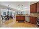 Bright kitchen with granite countertops, stainless steel appliances, and an adjacent dining area at 2000 Taney Way, Indian Land, SC 29707