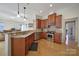 Well-equipped kitchen featuring stainless steel appliances, granite counters, and stylish tile backsplash at 2000 Taney Way, Indian Land, SC 29707