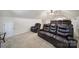Spacious living room featuring rows of theater seats and a ceiling fan at 2000 Taney Way, Indian Land, SC 29707
