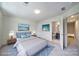 Bedroom with coordinated décor, complemented by an ensuite bathroom and bright walls at 2000 Taney Way, Indian Land, SC 29707
