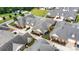 Aerial view of a well maintained community with manicured lawns and gardens in a suburban setting at 2369 Stardust Ct, Denver, NC 28037