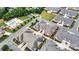 Aerial view of the home outlined in red, located near a pool and tennis court in a well-maintained neighborhood at 2369 Stardust Ct, Denver, NC 28037