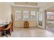Bright office with large windows, tiled floor, and access to outdoor porch at 2369 Stardust Ct, Denver, NC 28037