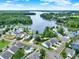 Stunning aerial view of waterfront homes surrounded by lush greenery at 25391 Seagull Dr, Lancaster, SC 29720