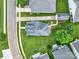 Aerial view of a home featuring a well-manicured lawn and a detached garage at 25391 Seagull Dr, Lancaster, SC 29720