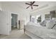 Tranquil bedroom featuring plenty of natural light, neutral decor, and an ensuite bathroom at 25391 Seagull Dr, Lancaster, SC 29720