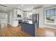 Stylish kitchen with granite counters, island, and stainless appliances at 25391 Seagull Dr, Lancaster, SC 29720