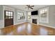 Bright living room features a fireplace and hardwood flooring at 25391 Seagull Dr, Lancaster, SC 29720