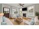 Bright living room with hardwood floors, fireplace, and natural light at 25391 Seagull Dr, Lancaster, SC 29720
