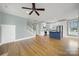 Open living space featuring hardwood floors and staircase at 25391 Seagull Dr, Lancaster, SC 29720