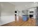Bright, open living space with hardwood floors flowing into the modern kitchen and living area at 25391 Seagull Dr, Lancaster, SC 29720