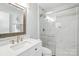 This bathroom features marble-styled walls and a shower at 3020 Heathstead Pl # A, Charlotte, NC 28210