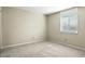 This carpeted bedroom has a window overlooking the outside at 3020 Heathstead Pl # A, Charlotte, NC 28210