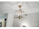 Modern light fixture in dining area near kitchen at 3020 Heathstead Pl # A, Charlotte, NC 28210