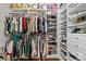 Walk-in closet with custom shelving, providing ample storage for clothes, shoes, and accessories at 3020 Waxhaw Crossing Dr, Waxhaw, NC 28173