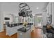 Spacious kitchen features an island, breakfast bar, white cabinets and granite countertops at 3020 Waxhaw Crossing Dr, Waxhaw, NC 28173