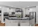 Eat-in kitchen with granite countertops, white cabinets and stainless steel appliances at 3020 Waxhaw Crossing Dr, Waxhaw, NC 28173